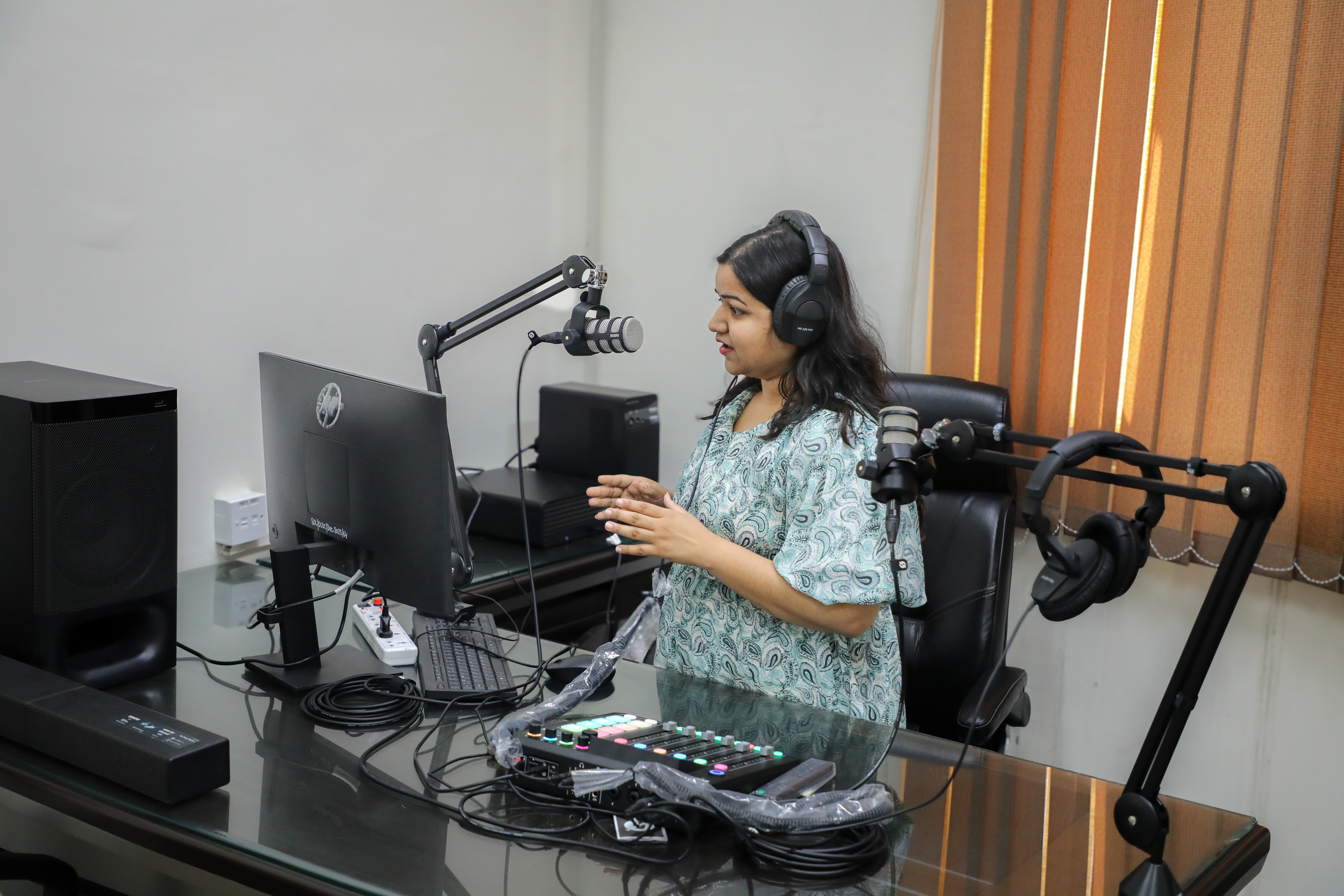 Person in a radio recording studio